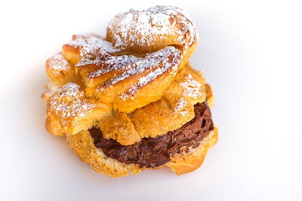 istock Chocolate Cream Puff on White Background 526902251