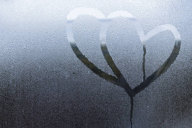 istock drawing heart love on water drop 526902311
