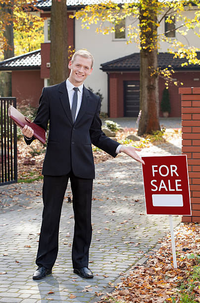 istock Smiling real estate broker 526916781