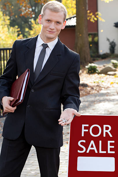 istock Handsome real estate broker 526917861