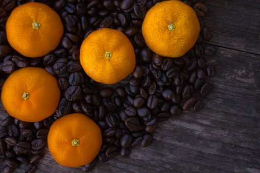 Small tangerines and coffee