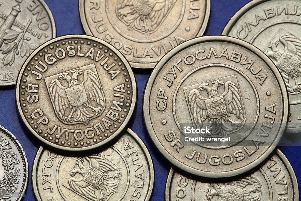 Coins of Yugoslavia Coins of Yugoslavia. Yugoslav national coats of arms depicted on the Yugoslav novi dinar coins (2002). 2002 Stock Photo