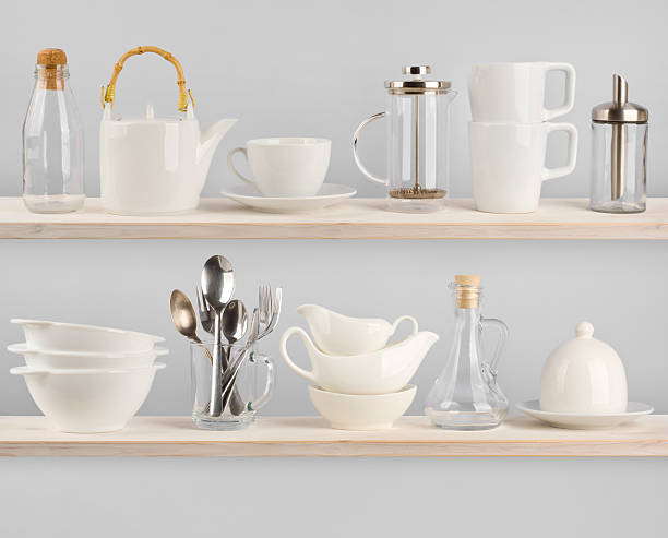 istock Various kitchen utensils on wooden shelves 526920327