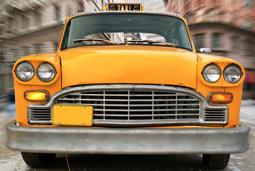 Yellow vintage taxi in new York, retro car