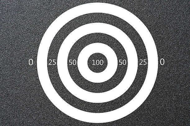 istock Texture of rough sandpaper with target and score 526920857
