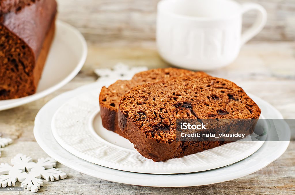chocolate bread with chocolate chips chocolate bread with chocolate chips on a white wood background. tinting. selective focus Baked Pastry Item Stock Photo