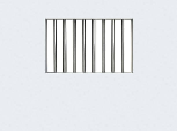 istock The interior of the prison cell, barred window 526921447