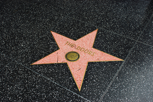 Hollywood, USA - April 18, 2014: The Doors star on Hollywood Walk of Fame in Hollywood, California. This star is located on Hollywood Blvd. and is one of over 2000 celebrity stars embedded in the sidewalk.
