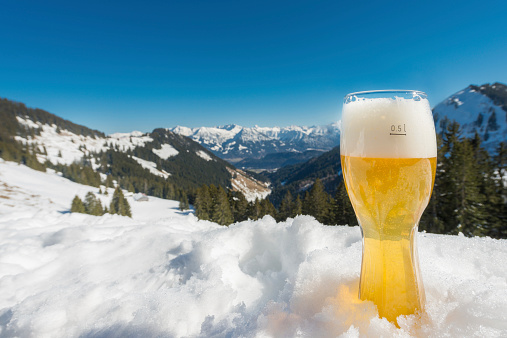 Bavarian wheat beer in winter landscape