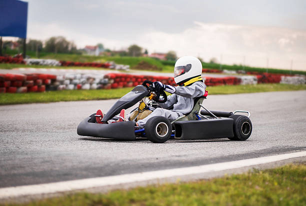 Go-carting. Man driving go-cart on a sports track. go carting stock pictures, royalty-free photos & images