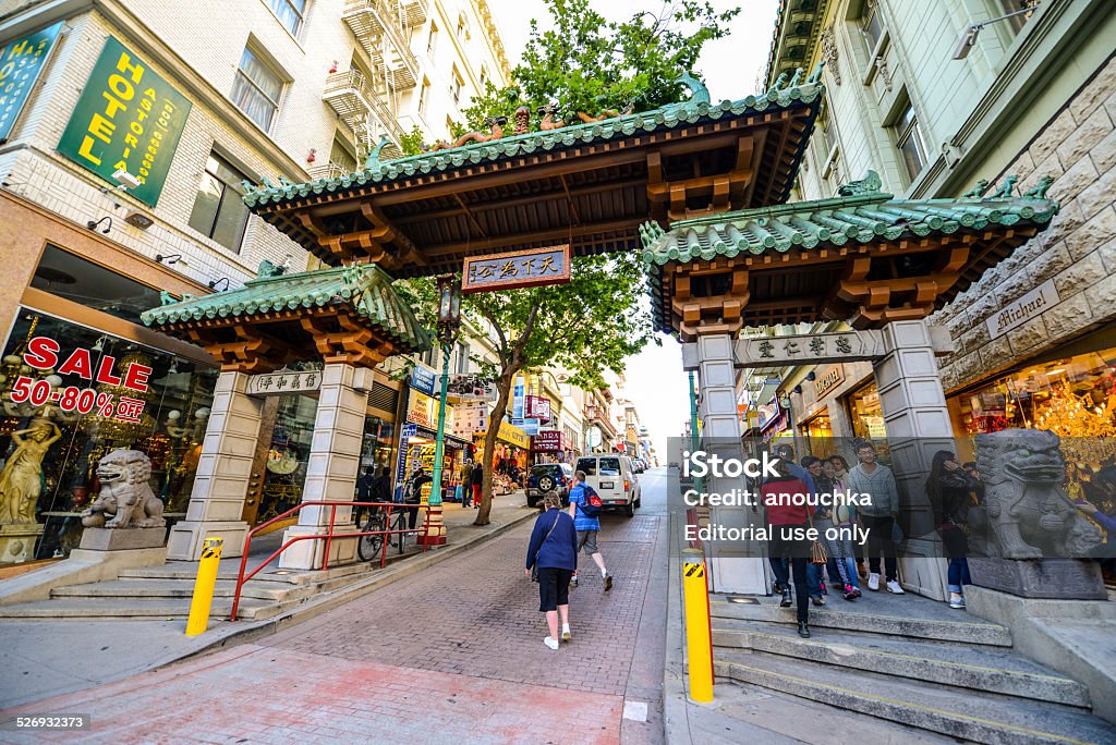 San Francisco Chinatown Gate San Francisco, USA - May 23, 2013: San Francisco Chinatown Gate, main entrance, people visible on the street. San Francisco - California Stock Photo