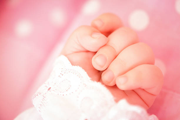 istock Newborn baby hand 526933747