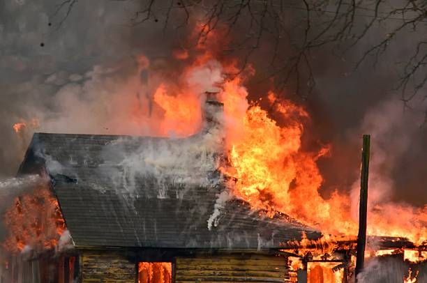 istock Old Wood Home Burning To The Ground 526934041