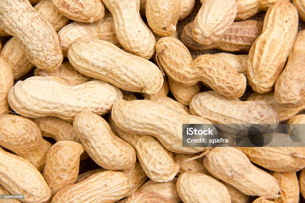 Peanuts close Some peanut seen up close from above Bowl Stock Photo