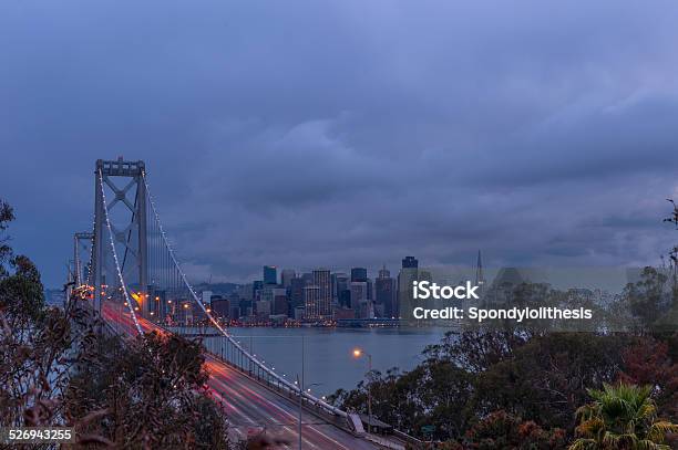 San Francisco Skyline And Bay Bridge At Cloudy Sunrise Califonia Stock Photo - Download Image Now