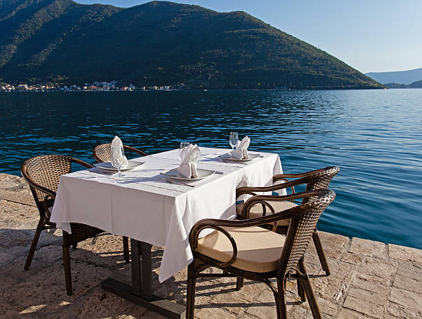 istock Scenic cafe table near the sea 526946735