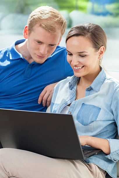 istock Man woman and laptop 526949163