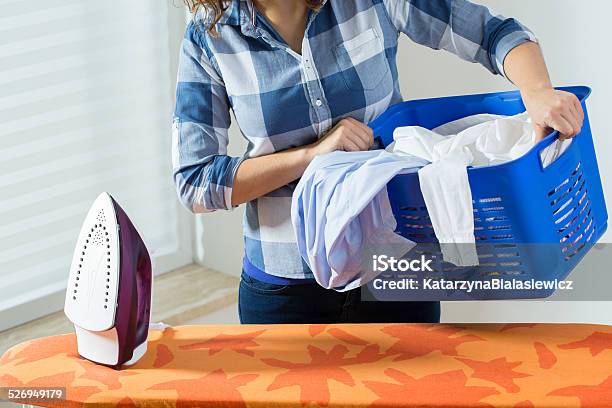 Woman With Clothes Before Ironing Stock Photo - Download Image Now - Activity, Adult, Adults Only