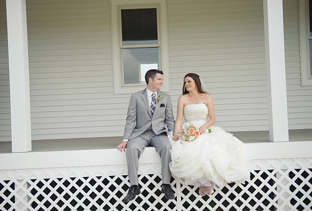 istock Bride and Groom Sitting Together 526953689