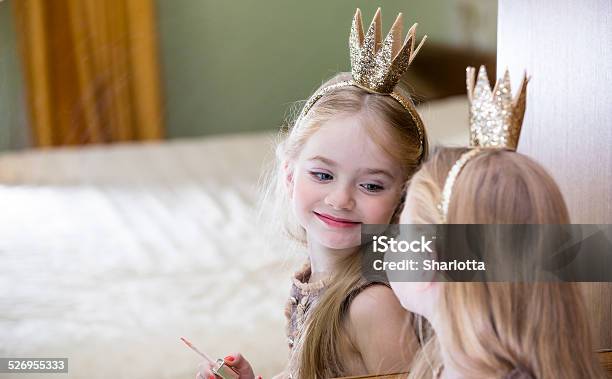 The Little Princess Looks In The Mirror Stock Photo - Download Image Now - Girls, Princess, Mirror - Object