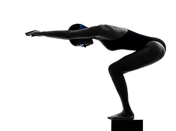istock woman competition swimmer on starting silhouette 526958829