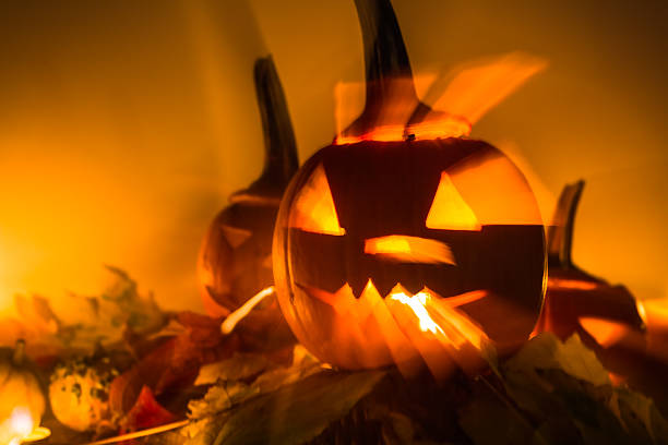 istock Abstract Halloween pumpkin lanterns dark light angry face fall b 526959617