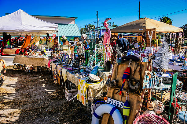 Crafts Market at the Flea Market at Longboat Key in Florida Longboat Key, FL, USA – December 2, 2012: Hand crafted beachcomber style décor merchandise on sale at the weekly craft market at Longboat Key on Anna Maria Island in Florida longboat key stock pictures, royalty-free photos & images