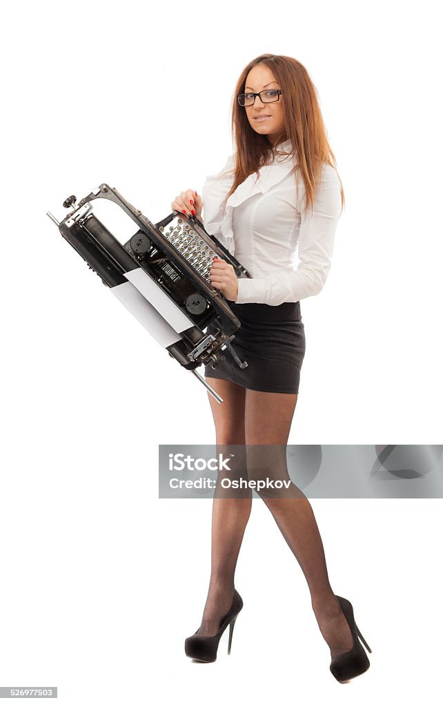 Secretary with long legs Secretary with long legs and a typewriter on a white background. Administrator Stock Photo
