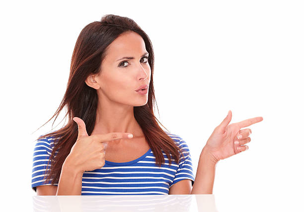 istock Charming brunette with fingers gesturing a handgun 526979653