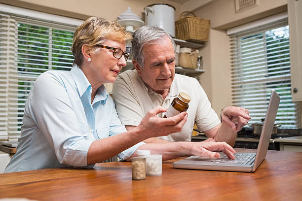 istock Senior couple looking up medication online 526980237