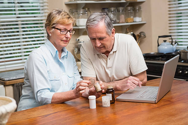 istock Senior couple looking up medication online 526980253