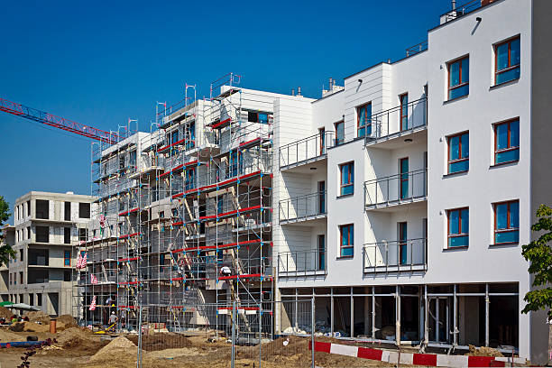 istock Complex of apartment buildings under construction 526981899