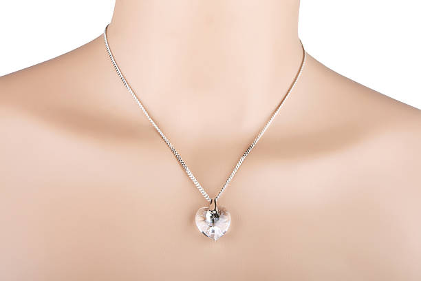 istock Silver necklace with heart pendant 527011239