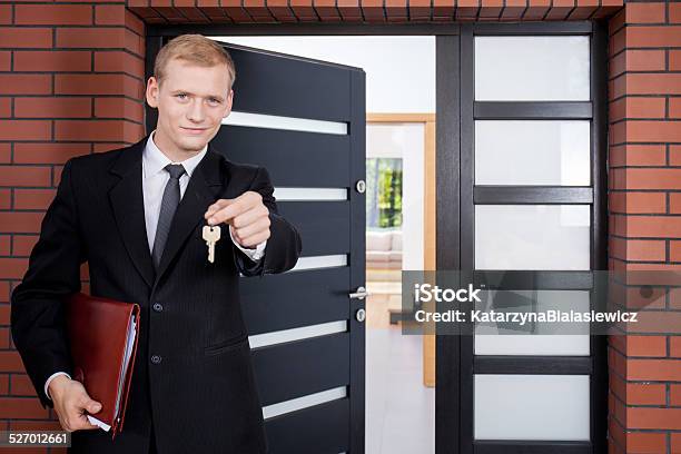 Standing In Front Of Door Stock Photo - Download Image Now - Adult, Apartment, Beauty