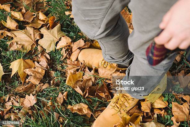 Standing Among The Leaves Stock Photo - Download Image Now - Autumn, Boot, Grass