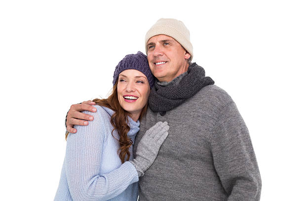 istock Couple in warm clothing embracing 527014949