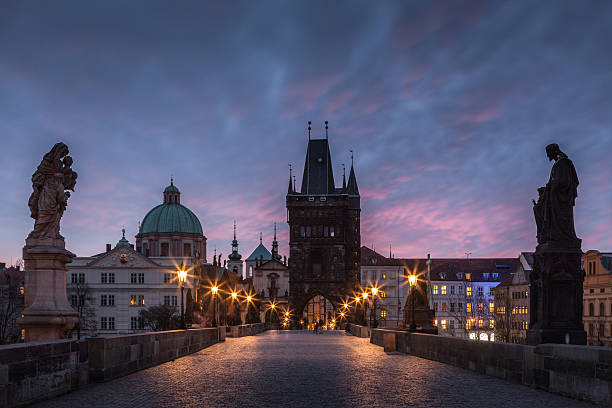 istock Prague. Charles Bridge at red dawn 527015011