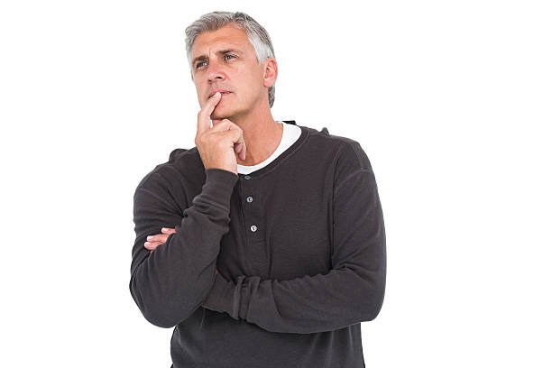 istock Casual man thinking with hand on chin 527015427