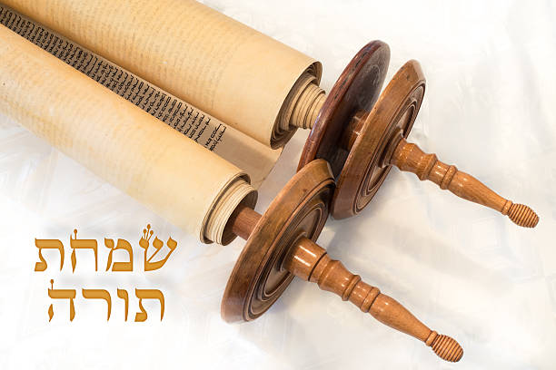 Simchat Torah greeting card Simchat Torah greeting card illustrating semi-open Torah Scroll on synagogue altar. simchat torah photos stock pictures, royalty-free photos & images