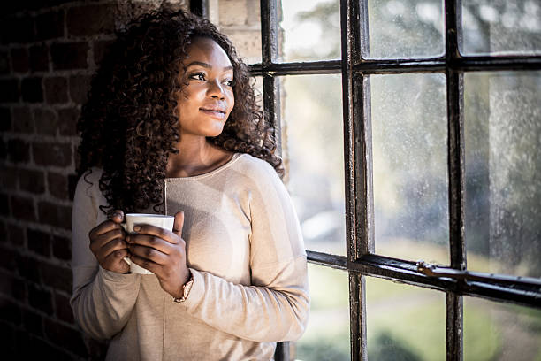 istock Nostalgic woman at home 527031695