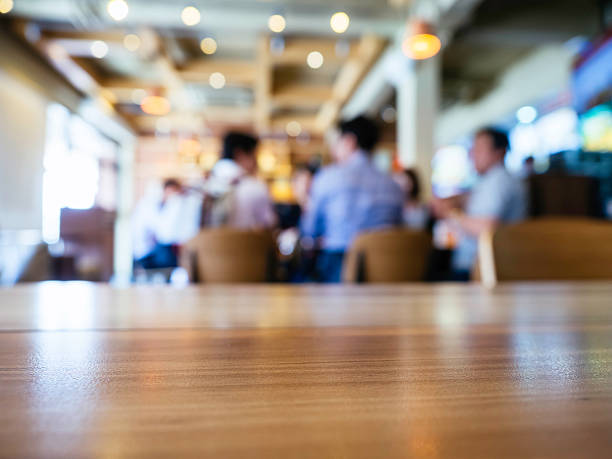 istock Table top Counter with Blurred People and Restaurant Shop interior 527032272