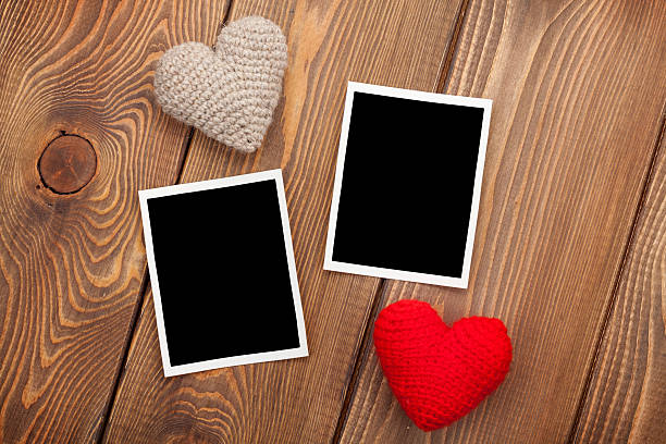 istock Photo frames and valentines toy hearts 527032399