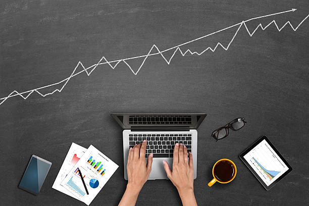 istock Market research business reports on laptop 527032874