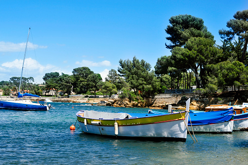 view of some fishing boats moored in the Mediterranean sea, in the French Riviera, France