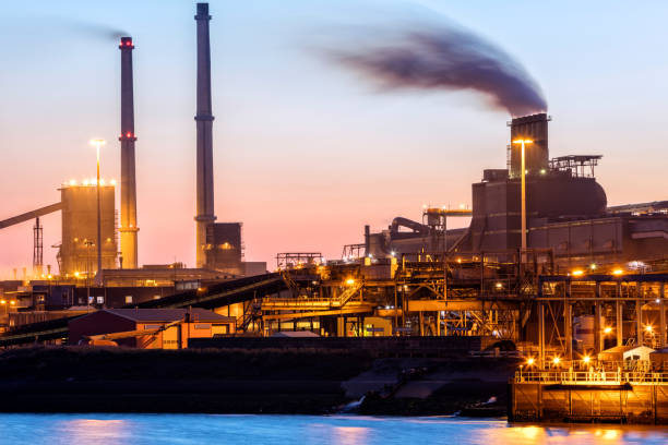istock Illuminated Industrial Plant on the River at Night,  Amsterdam, Netherlands 527034320