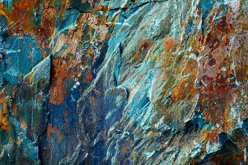 horizontal shot of rock background, textured in spring day, Carpathian Mountains, close up.