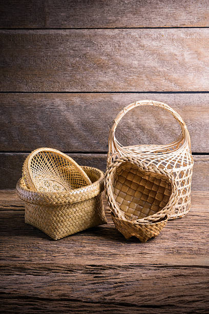 bamboo basket, Wicker basket Group of bamboo basket, Wicker basket on wooden background interlace format stock pictures, royalty-free photos & images