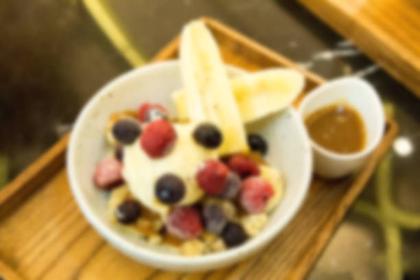 istock vanilla ice-cream and berry in white plate 527036076