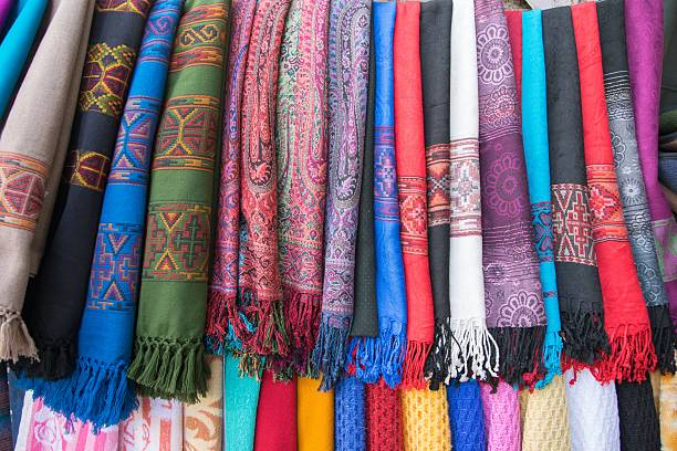 istock Bright oriental coloured cloth fabric background 527039624