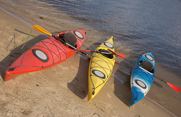 istock Camping with kayaks on the beach 527042328